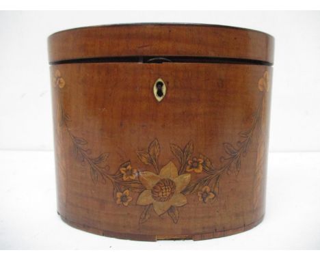 A George III Sheraton satinwood and marquetry oval tea caddy with a hinged lid enclosing a paper lined interior with a later 