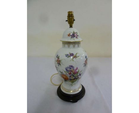 Limoges table lamp decorated with floral sprays on raised wooden stand