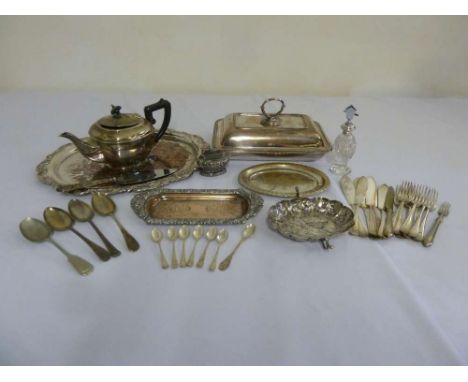 A quantity of silver plate to include a tray, entree dish and cover, teapot and bonbon dish