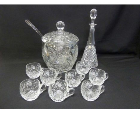 Cut glass punch bowl with cover, ladle, eight cups and a decanter with drop stopper