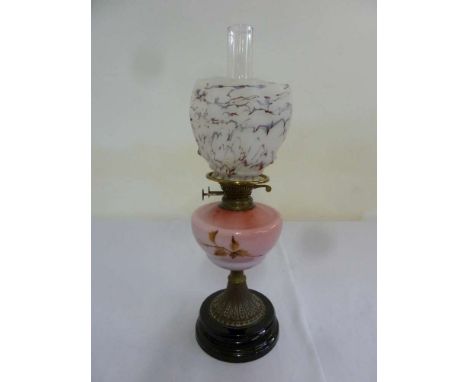 Victorian decorative oil lamp to include glass shade and funnel on raised circular plinth