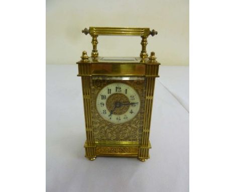 French gilt metal carriage clock with enamel dial and Arabic numerals