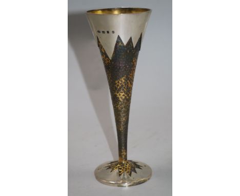 A Stuart Devlin textured hammered silver trumpet shaped goblet, London, 1990, 19.4cm, gross 287 grams.