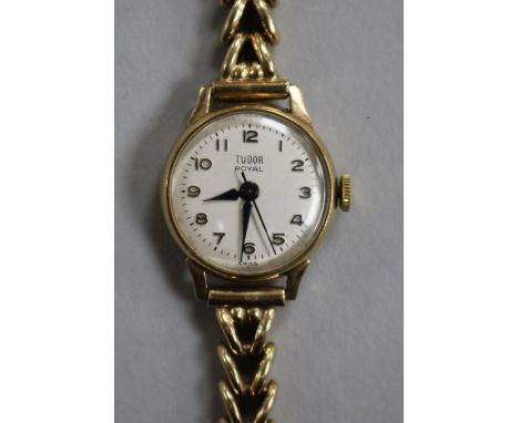 A lady's 1960's 9ct gold Tudor Royal manual wind wrist watch, on a 9ct gold bracelet.