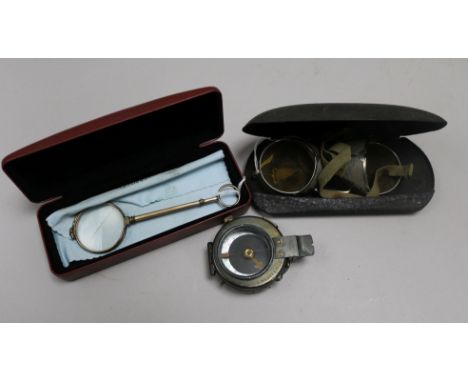 A Halden military compass, a pair of driving glasses and a pair of lorgnettes