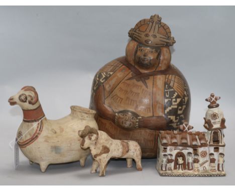 Peruvian pottery: a Nazca style flask, a Llama shaped vessel, a model of a church and a model of a bull, all acquired in Peru