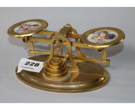 A set of Edwardian ormolu and porcelain letter scales, signed Phillipson & Golder, Chester