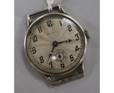 A gentleman's late 1920's silver Genex manual wind wrist watch with sunburst dial (no strap).