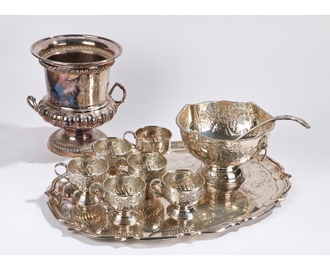 Plated champagne bucket with gadrooned rim and lower section,  plated oval tray with gadrooned rim, plated punch bowl, ladle 