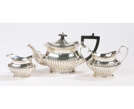 Edward VII silver tea set, Birmingham 1907, maker S Blanckensee &amp; Son Ltd, consisting of teapot with gadrooned ebony fini