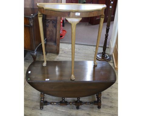 A dark Ercol style drop leaf coffee table, a 'D' end occasional table and a standard lamp