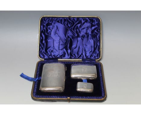 A HALLMARKED SILVER CASED SMOKERS CASE SET BIRMINGHAM 1896, consisting of a cigar case, cigarette case and vesta case, maker'