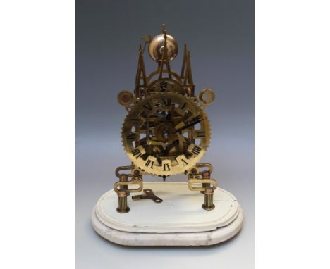 A LATE VICTORIAN SKELETON CLOCK, the Gothic inspired frame with triple steeple upper section, twin fusee movement, anchor esc