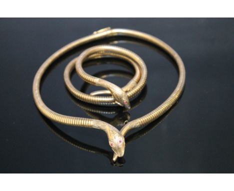 A HALLMARKED 9 CARAT GOLD SNAKE NECKLACE AND BANGLE SET, on snake link 'chain' which is fitted with a steel spring, both snak