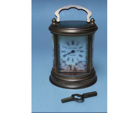 AN 'ELLIOTT & SON, LONDON' BRASS CASED MINIATURE CARRIAGE CLOCK, circular form, enamel face with Roman numerals and outer min