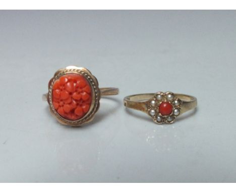 A HALLMARKED 9 CT GOLD AND CORAL LADIES DRESS RING, the coral panel with floral carving, together with a 9ct gold coral and s