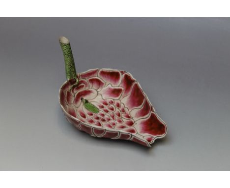 AN EARLY 20TH CENTURY CHINESE FAMILLE ROSE LOTUS LEAF LIBATION CUP, Guangxu period, dated by inscription to the stem, modelle
