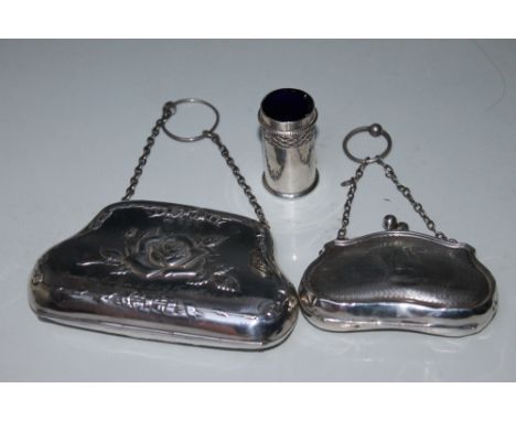 TWO HALLMARKED SILVER PURSES, the larger dated Birmingham 1918 with rose decoration and presentation inscription, the smaller