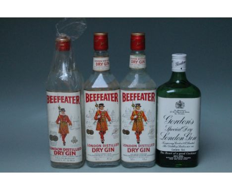 THREE BOTTLES OF BEEFEATER GIN TOGETHER WITH ONE BOTTLE OF GORDON'S GIN (4)