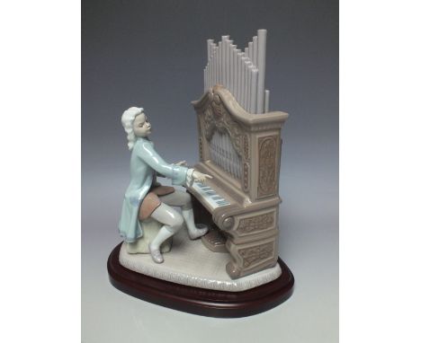 LLADRO 'J.S.BACH' 250TH ANNIVERSARY FIGURE, limited edition, depicting Bach playing a pipe organ, raised on wooden plinth, ov