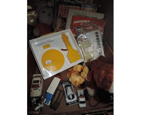 A box of toys including Fisher Price record player, dire cast cars, Magic Robot etc