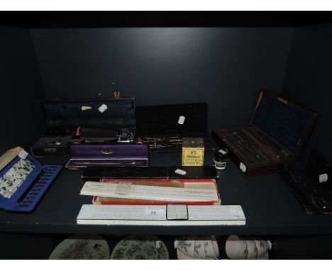 A selection of desk top office stationary including geometry set and ink nibs