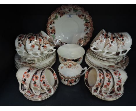 A selection of tea cups and saucers including Mason's in the Franklin design