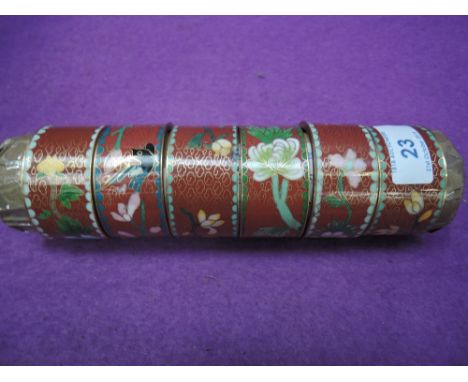 A selection of including enamel and cloisone napkin or similar rings 