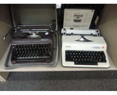 An Olympia typewriter in brown in a hard case AND an olympia electric deluxe typewritter