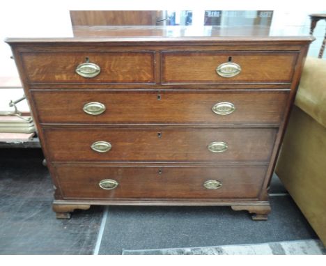 An early 19th century oak chest of two short and three long cockbead drawers on bracket feetH x 38.5" x W 48" x D 22"