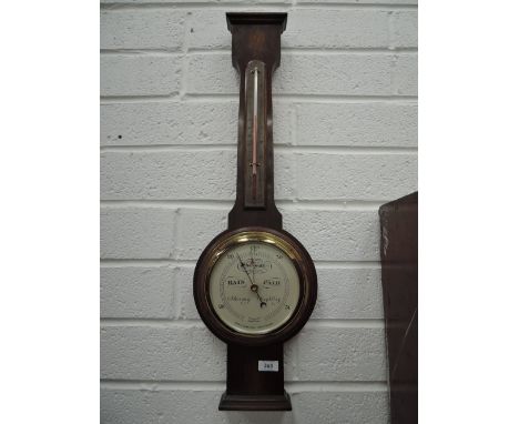 A wall mounted barometer by Short and Mason