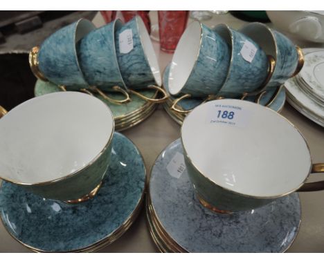 A selection of Royal Albert Gossamer cups annd saucers