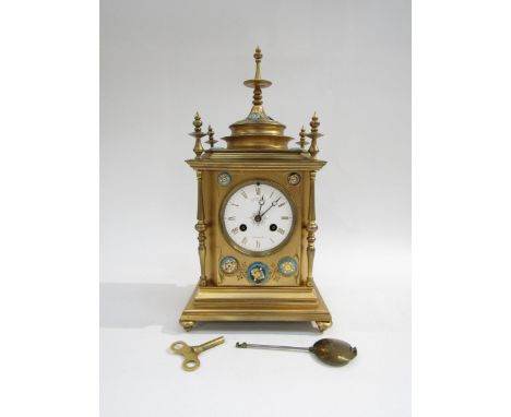 An Aubert &amp; Co Regent Street gilt brass mantel clock with French movement striking on a bell. Pagoda style gilt brass cas