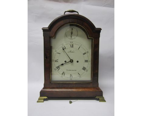 A Georgian mahogany bracket clock, Baker Tamworth, with arch white dial and Roman numerals, also outer minutes dial along wit