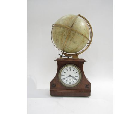 A Thwaites of London desk clock with mechanical atlas globe, 41.5cm tall 