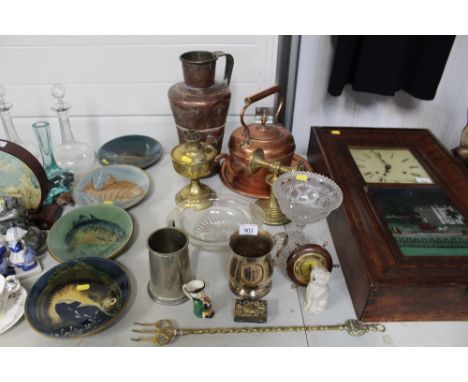 A collection of metal ware to include copper kettle, brass oil lamp, silver plated tankard, glassware etc.