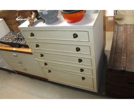 A modern white bedroom chest fitted five drawers