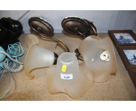 Three wall light fittings and shades 