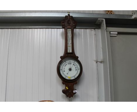 A thermometer/barometer 