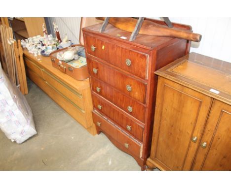 A stained wooden chest fitted five drawers