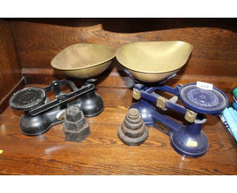 A set of salter scales and weights together with another set of scales and weights