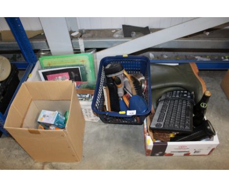 Four boxes containing various sundry items to include light bulbs, brushes, keyboard, a pair of Wellington boots etc.