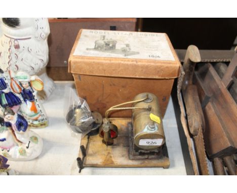 A model steam engine with box