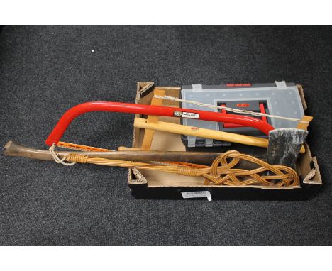 A box of Keter plastic tool box and hand tools, two saws, large axe and carpet beater 