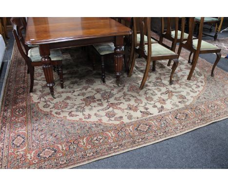 A twentieth century floral Axminster carpet, 407cm by 321cm