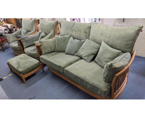 A modern Ercol renaissance suite consisting of a sofa, pair armchairs and a footstoolLocation: 