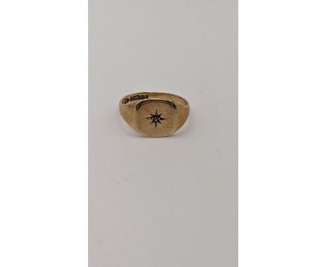 A 9ct gold signet ring set with a central red garnet, 4gLocation: 