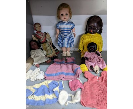 A group of 1950s and earlier dolls to include an English doll with speaker box, sleeping blue eyes and jointed body, along wi