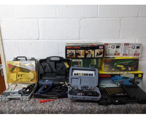 Two Black and Decker folding Workmate benches, and various cased and boxed Bosch, Powershot and Black and Decker tools includ