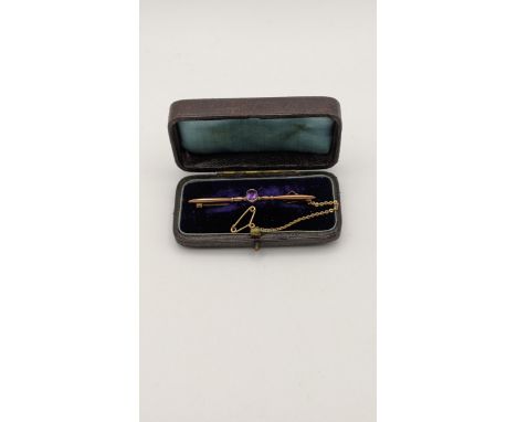 A late 19th/early 20th century 9ct gold stick pin inset with an amethyst 3.2g in a caseLocation: 